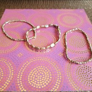 3 Gold beaded bracelets
